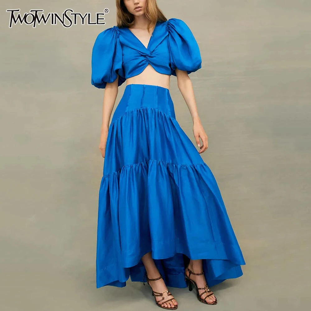 TWOTWINSTYLE Solid Two Piece Set for Women V Neck Short Sleeve Tops High Waist A Line Spliced Fold Skirts Minimalist Sets Female
TWOTWINSTYLE Solid Two Piece Set for Women V Neck Short Sleeve Tops High Waist A Line Spliced Fold Skirts Minimalist Sets Female