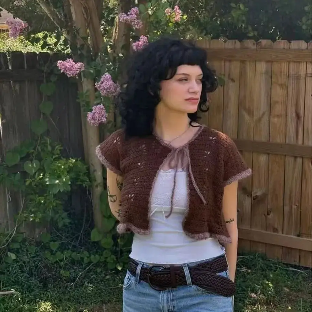 Hollow lace up short sleeved vest pullover, loose and comfortable, hand woven mohair sweater women's spring and autumn new style
Hollow lace up short sleeved vest pullover, loose and comfortable, hand woven mohair sweater women's spring and autumn new style
