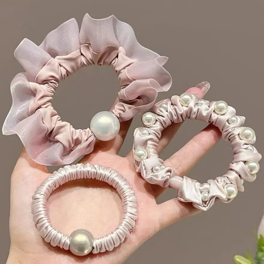 Korean-style pink pearl hair tie, high elasticity ponytail hair band for women
Korean-style pink pearl hair tie, high elasticity ponytail hair band for women