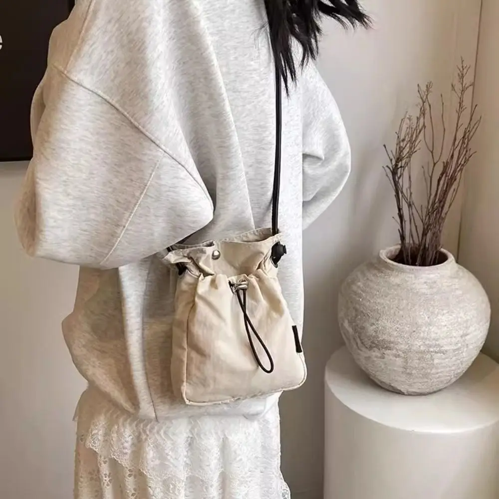 Sweet Korean Style Drawstring Canvas Bag Purse Crossbody Bag Nylon Shoulder Bag Solid Color Wallet Bags Mobile Phone Bag Women
Sweet Korean Style Drawstring Canvas Bag Purse Crossbody Bag Nylon Shoulder Bag Solid Color Wallet Bags Mobile Phone Bag Women