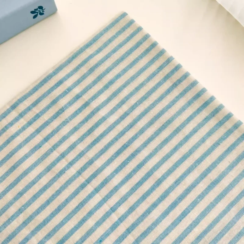 Blue striped fabric, used for handmade clothing, tablecloths, and other fabrics.
Blue striped fabric, used for handmade clothing, tablecloths, and other fabrics.