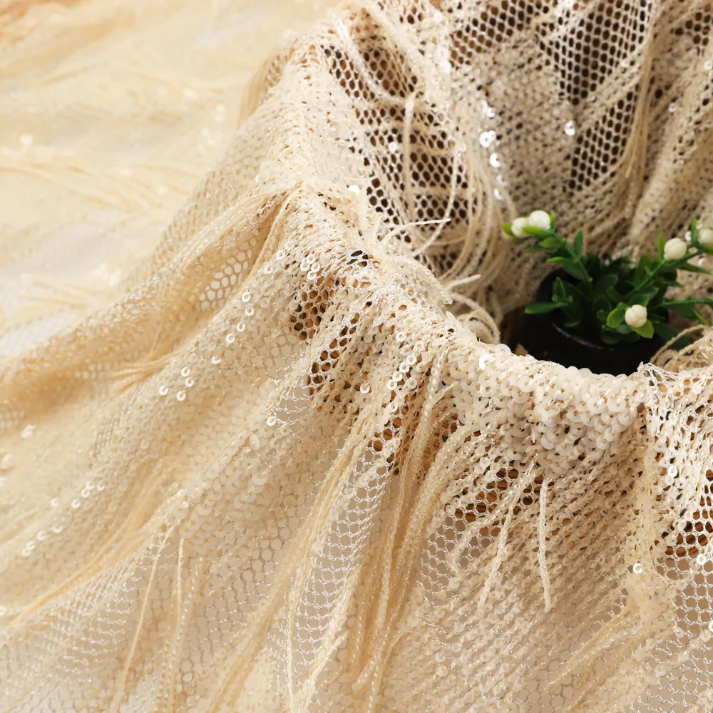 New 3D tassel hollow-out sequin lace embroidered fabric for wedding dresses and evening gowns, mesh embroidered cloth
New 3D tassel hollow-out sequin lace embroidered fabric for wedding dresses and evening gowns, mesh embroidered cloth