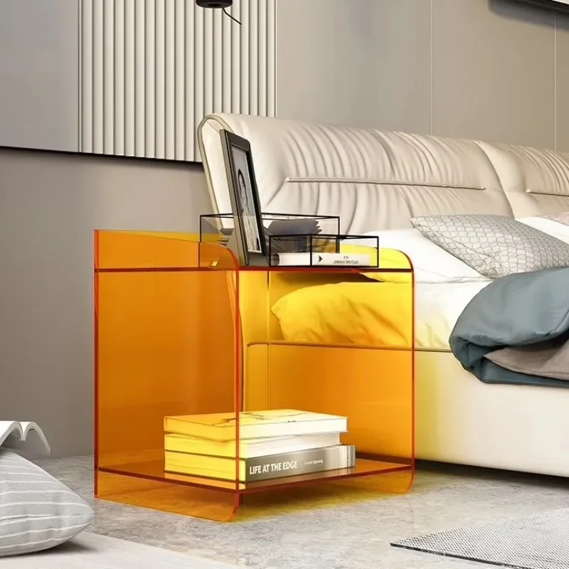 Acrylic bedside table with simple edge corners and storage.
Acrylic bedside table with simple edge corners and storage.