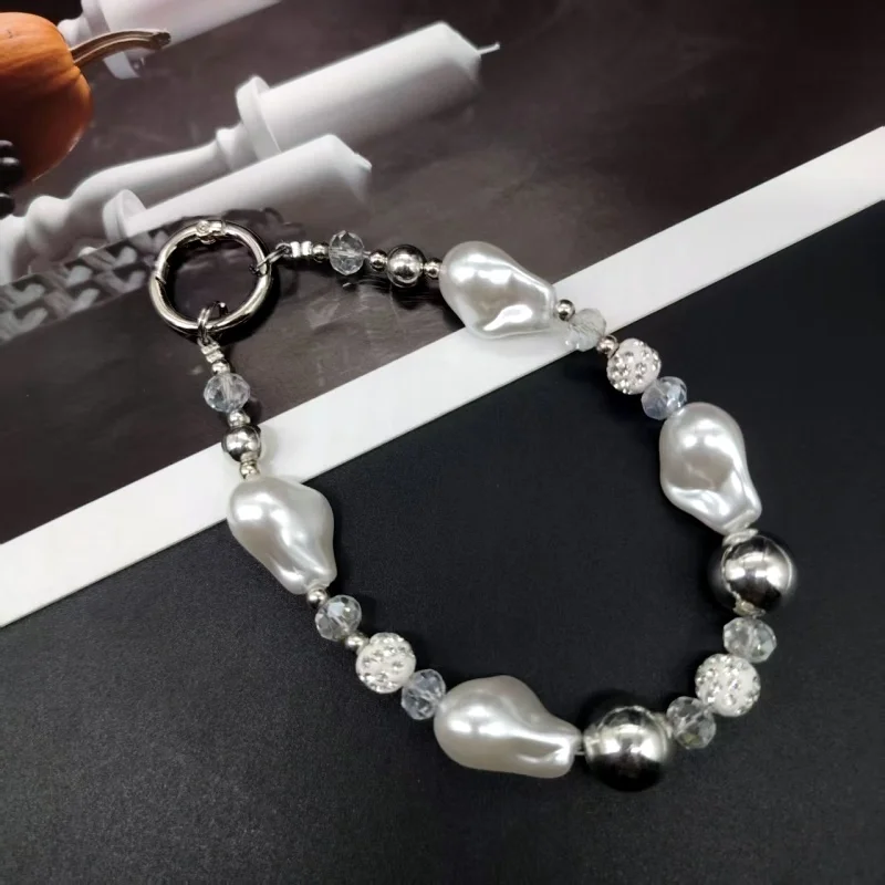 Elegant Women's Phone Lanyard with Rhinestones & Pearls, Fashionable Wrist Strap Keychain, Simple Design Accessory for Daily Use
Elegant Women's Phone Lanyard with Rhinestones & Pearls, Fashionable Wrist Strap Keychain, Simple Design Accessory for Daily Use