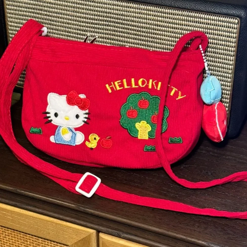 Hello Kitty Shoulder Bag Corduroy Red Adjustable Crossbody Bag Large Capacity Portable Canvas Embroidered Crossbody Bag
Hello Kitty Shoulder Bag Corduroy Red Adjustable Crossbody Bag Large Capacity Portable Canvas Embroidered Crossbody Bag