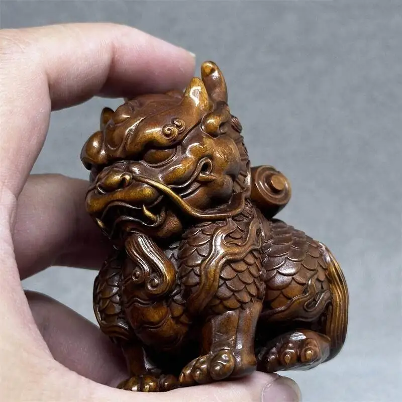 Retro boxwood carving Kirin auspicious beast desktop solid wood Chinese style decoration home feng shui lucky handicrafts
Retro boxwood carving Kirin auspicious beast desktop solid wood Chinese style decoration home feng shui lucky handicrafts