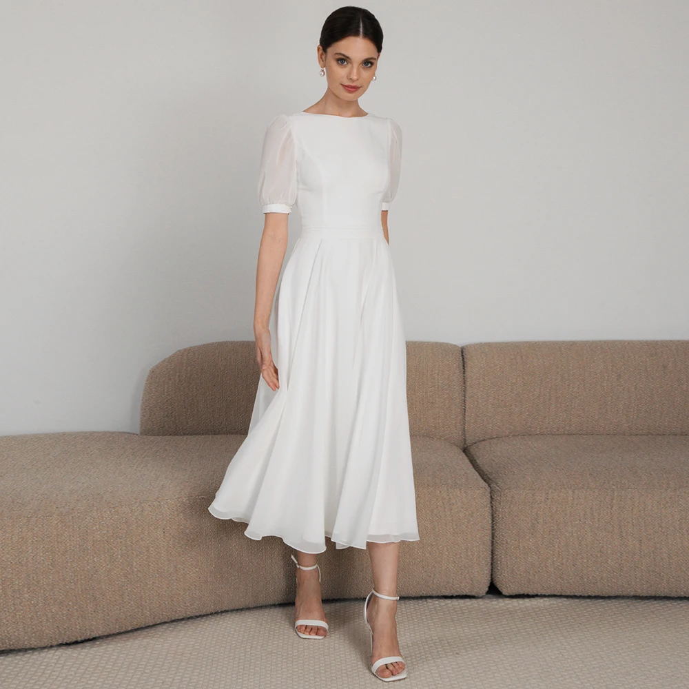 Classic White Short Sleeves Chiffon Wedding Dress for Women High Quality Customized Crew Neck A-Line Tea Length Bridal Gowns
Classic White Short Sleeves Chiffon Wedding Dress for Women High Quality Customized Crew Neck A-Line Tea Length Bridal Gowns