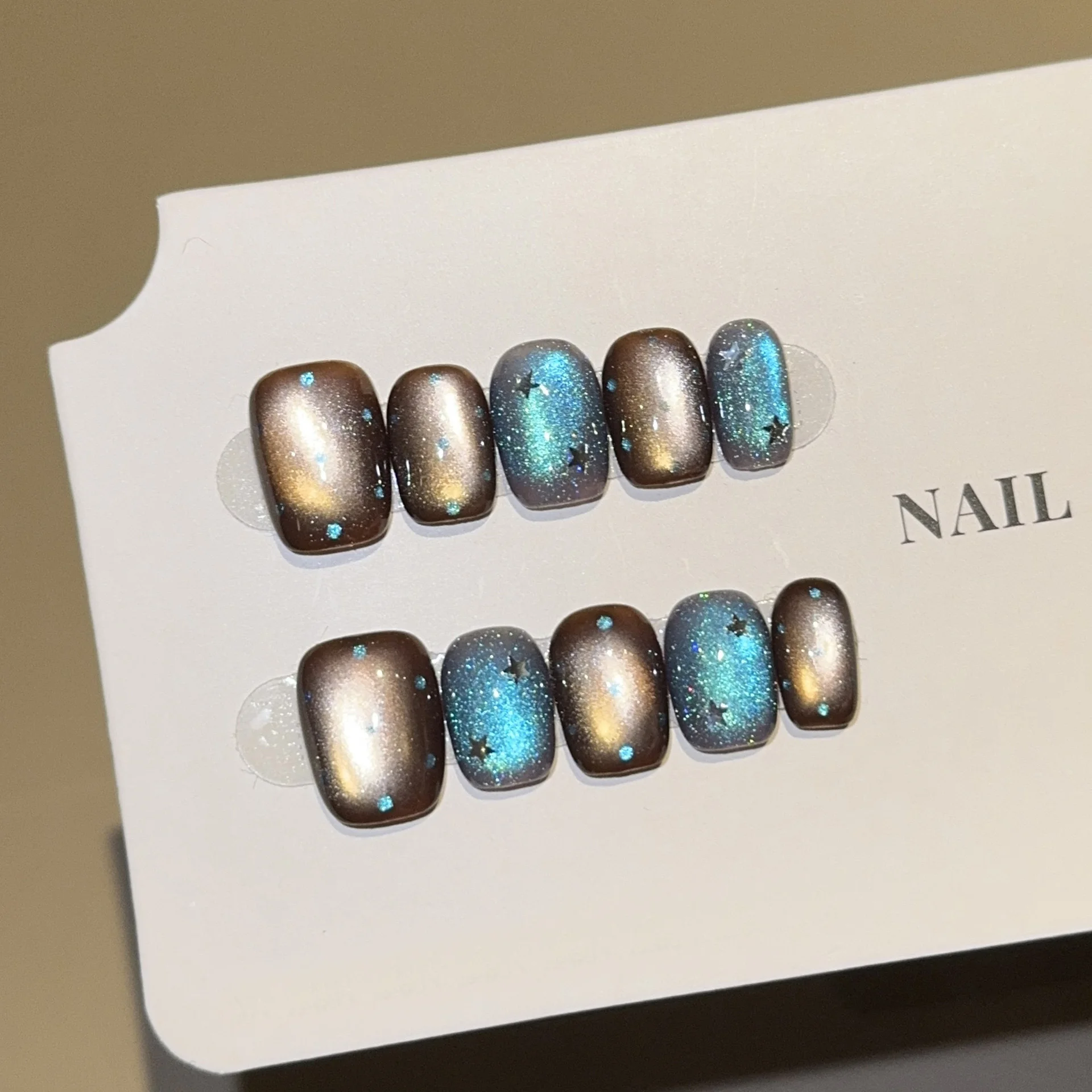 10pcs Brown-Blue Gradient Handmade Nails Firefly Stars Press on Nail Short Square Full Cover Nail Tips for Women&Girl False Nail
10pcs Brown-Blue Gradient Handmade Nails Firefly Stars Press on Nail Short Square Full Cover Nail Tips for Women&Girl False Nail