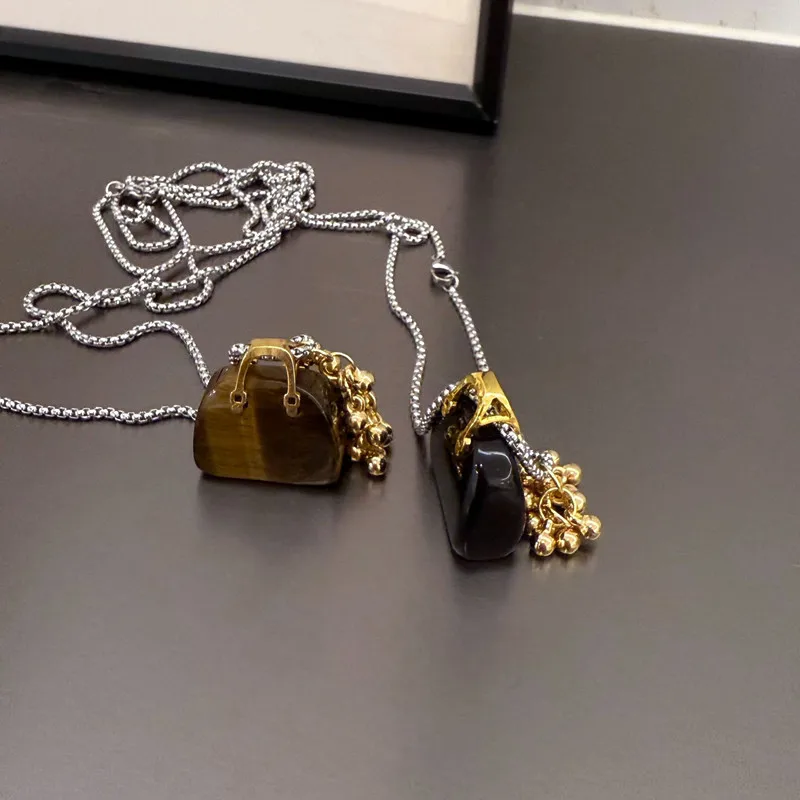 Luxury Bag Design Long Necklace For Women New Luxury Black Brown Strands Beaded Stone Pendant
Luxury Bag Design Long Necklace For Women New Luxury Black Brown Strands Beaded Stone Pendant