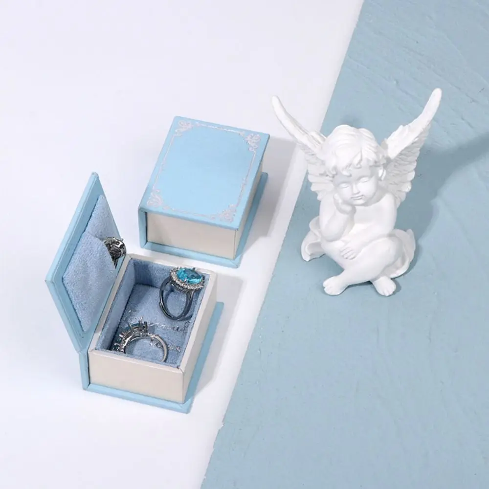 Flip Lid Book Shape Ring Box Storage Box Jewelry Packaging Engagement Ring Box Stud Earrings Ring Case Jewelry Display Case
Flip Lid Book Shape Ring Box Storage Box Jewelry Packaging Engagement Ring Box Stud Earrings Ring Case Jewelry Display Case