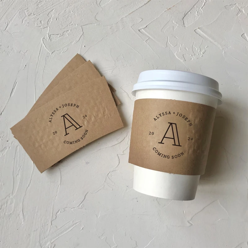 Personalized Disposable Paper Coffee Cup Sleeve for Wedding Custom 20-100ps Heat Insulation Drinks Cup Sleeves for Hot Beverages
Personalized Disposable Paper Coffee Cup Sleeve for Wedding Custom 20-100ps Heat Insulation Drinks Cup Sleeves for Hot Beverages