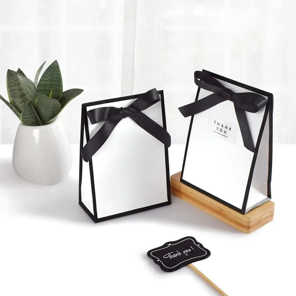 10pcs Portable Cardboard Paper Bow Ribbon Gift Bags Black and White Silk Scarf Handbag Gift Wrap Bags Birthday Gift Bags
10pcs Portable Cardboard Paper Bow Ribbon Gift Bags Black and White Silk Scarf Handbag Gift Wrap Bags Birthday Gift Bags