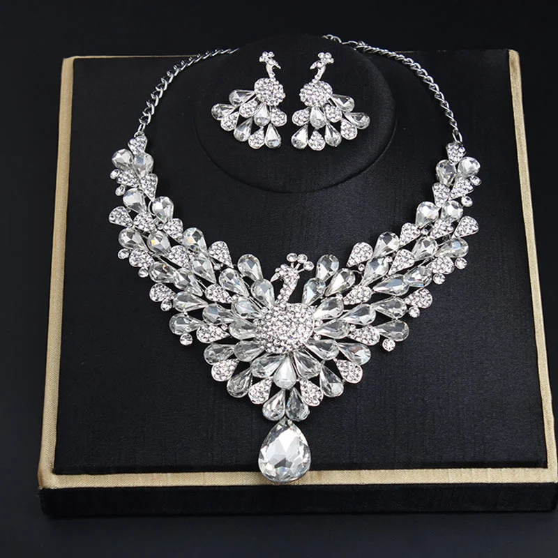 Ultra-shiny crystal gemstone peacock necklace, earrings, bracelet, formal dress jewelry, wedding accessory
Ultra-shiny crystal gemstone peacock necklace, earrings, bracelet, formal dress jewelry, wedding accessory
