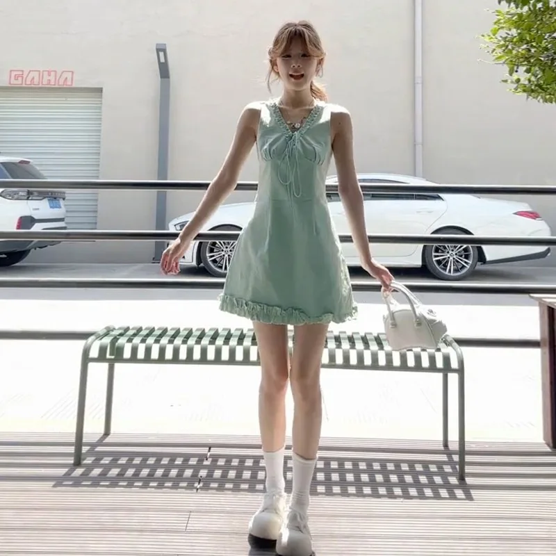 Korean Version Elegant Green Sleeveless V-neck Dress for Children 2026 Summer New Style Fashion Niche Design Unique Short Skirt
Korean Version Elegant Green Sleeveless V-neck Dress for Children 2026 Summer New Style Fashion Niche Design Unique Short Skirt