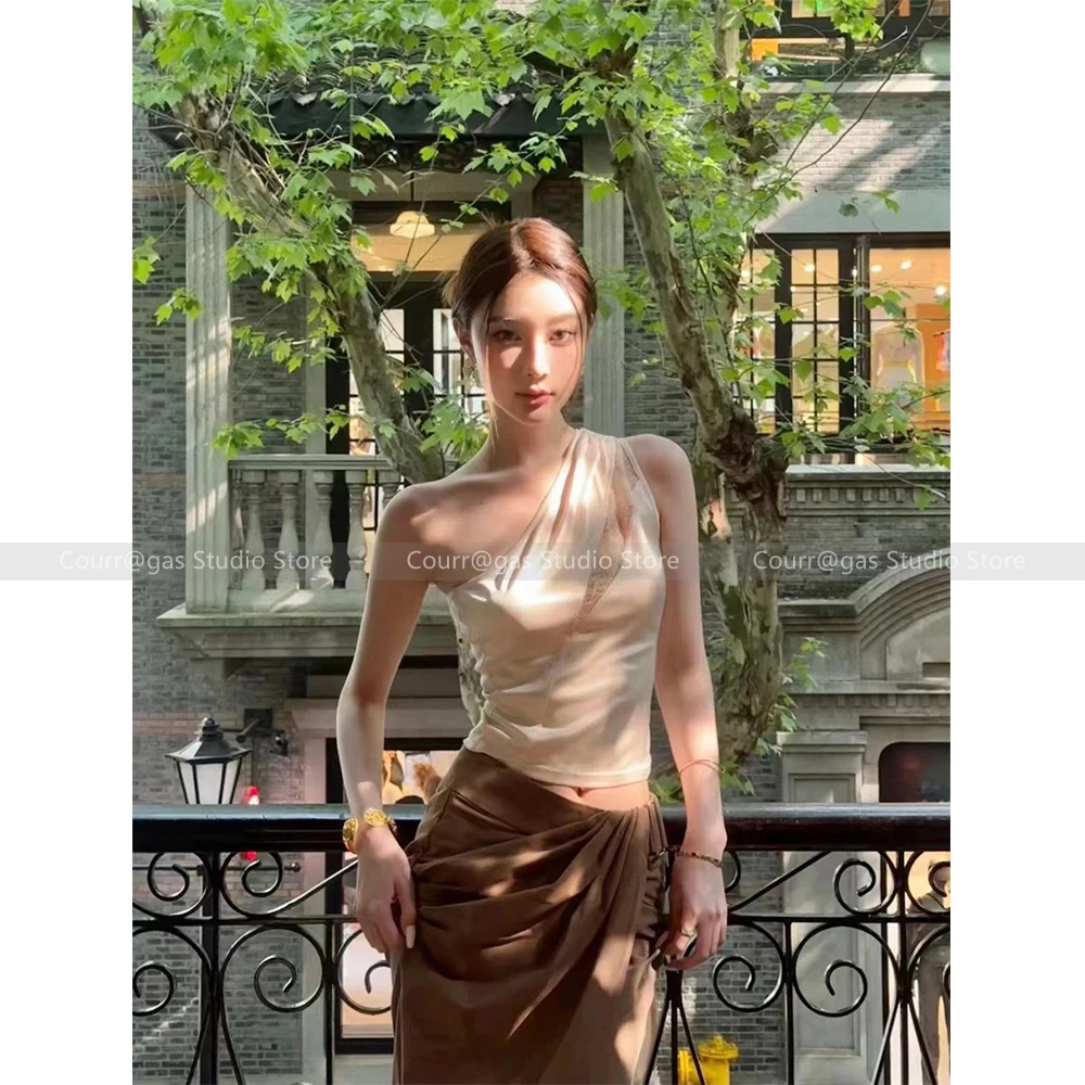 Summer new French lace stitching satin slim sleeveless tops female hot girl style off-shoulder halter neck vest
Summer new French lace stitching satin slim sleeveless tops female hot girl style off-shoulder halter neck vest