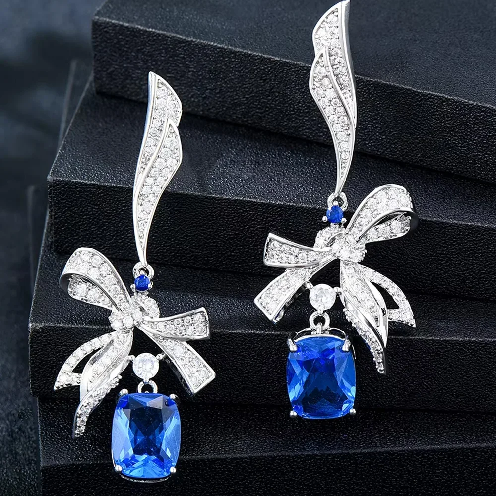 Soramoore Original Luxury Bow Blue Green Pendant Earrings For Women Wedding Party Earrings Jewelry High Quality Accessories
Soramoore Original Luxury Bow Blue Green Pendant Earrings For Women Wedding Party Earrings Jewelry High Quality Accessories