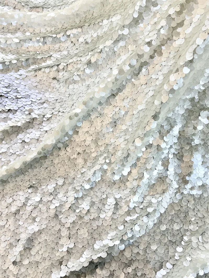 Heavy-duty full-sequin embroidered stretch mesh fabric for dresses, party gowns, dance costumes, DIY sewing fabric
Heavy-duty full-sequin embroidered stretch mesh fabric for dresses, party gowns, dance costumes, DIY sewing fabric