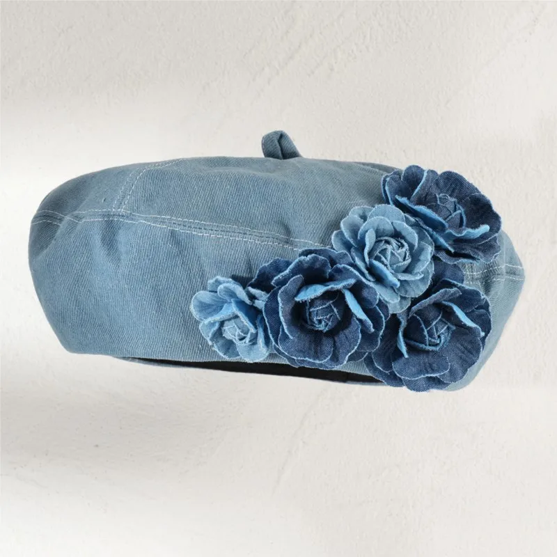 A lady wears light blue beret with floral decorations at the four corners for daily shopping
A lady wears light blue beret with floral decorations at the four corners for daily shopping
