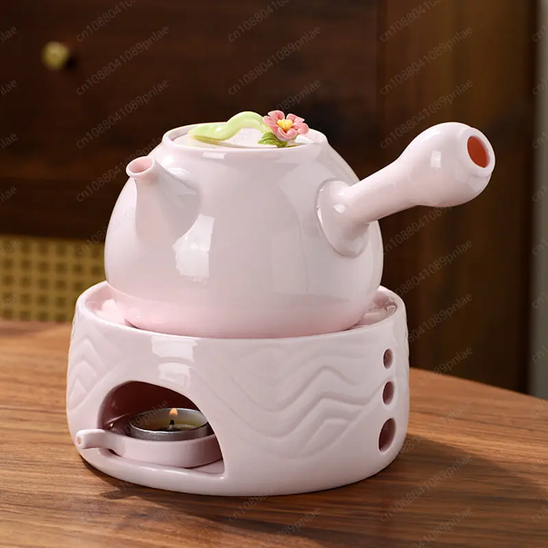Розовый керамический чайник, заваривание чая вокруг плиты, заварка чая для домашнего отеля
Розовый керамический чайник, заваривание чая вокруг плиты, заварка чая для домашнего отеля