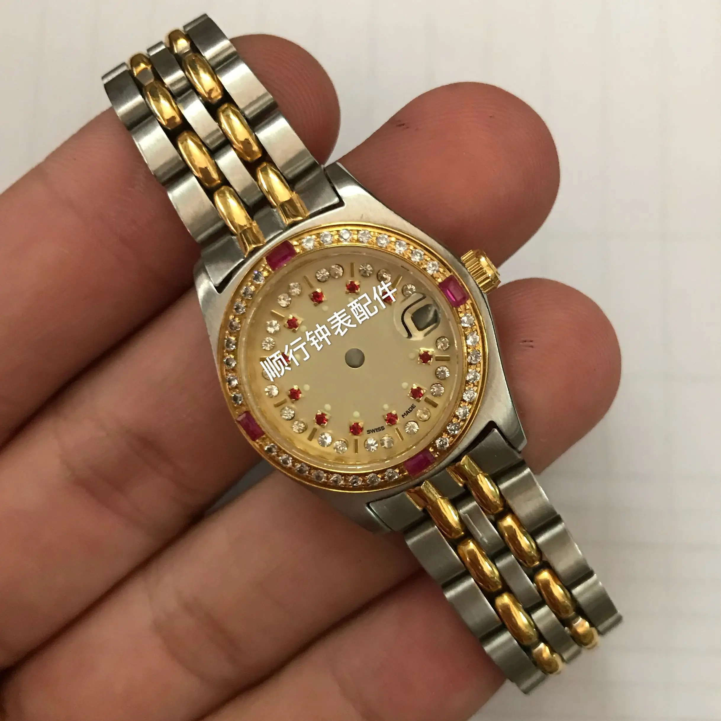 Watch accessory 2671 726 women's case ETA2671 movement case all steel set with gold and red bead dial
Watch accessory 2671 726 women's case ETA2671 movement case all steel set with gold and red bead dial