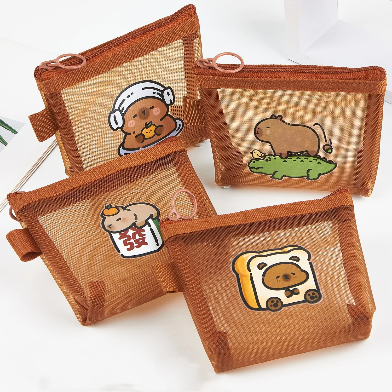 1PC Multifunctional Cartoon Capybara Small Coin Purse Mesh Key Case Mini Cosmetic Bag Transparent Portable Travel Storage Bag
1PC Multifunctional Cartoon Capybara Small Coin Purse Mesh Key Case Mini Cosmetic Bag Transparent Portable Travel Storage Bag