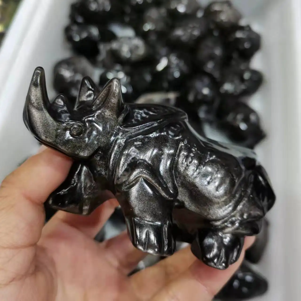Natural Silver obsidian Rhinoceros Figurine Hand Carved obsidian Rhino Statue Sculpture
Natural Silver obsidian Rhinoceros Figurine Hand Carved obsidian Rhino Statue Sculpture