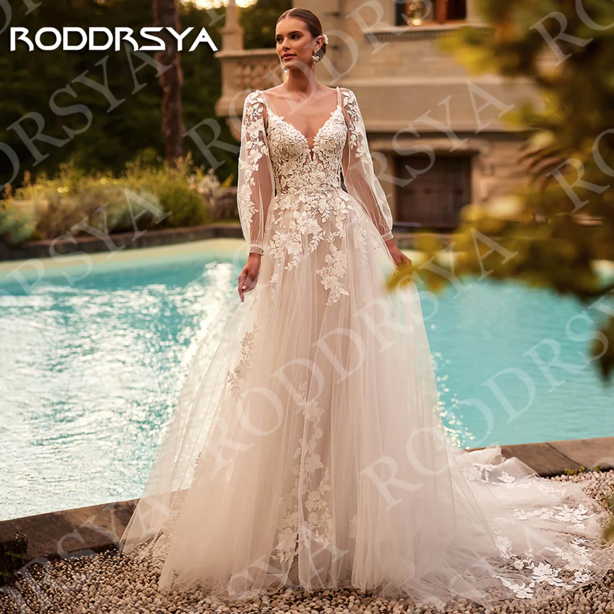 RODDRSYA A Line Long Sleeve Wedding Dresses Lace Applique Romantic V Neck Tulle Backless Bride Gown Customized robe mariée femme
RODDRSYA A Line Long Sleeve Wedding Dresses Lace Applique Romantic V Neck Tulle Backless Bride Gown Customized robe mariée femme