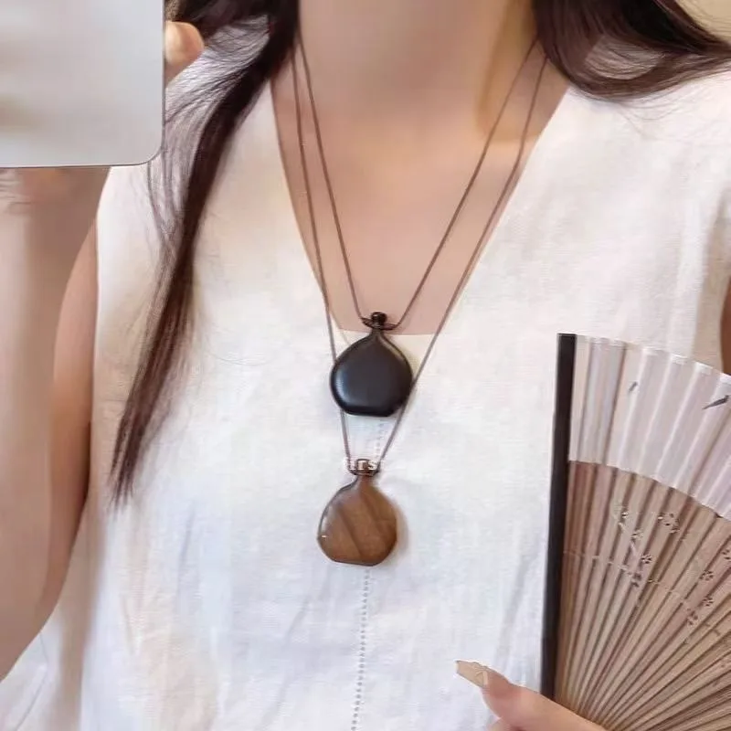 Blogger with The Same Simple Casual Wooden Wine Jug Pendant Necklace Fashionable Versatile Long Sweater Chain Accessories
Blogger with The Same Simple Casual Wooden Wine Jug Pendant Necklace Fashionable Versatile Long Sweater Chain Accessories