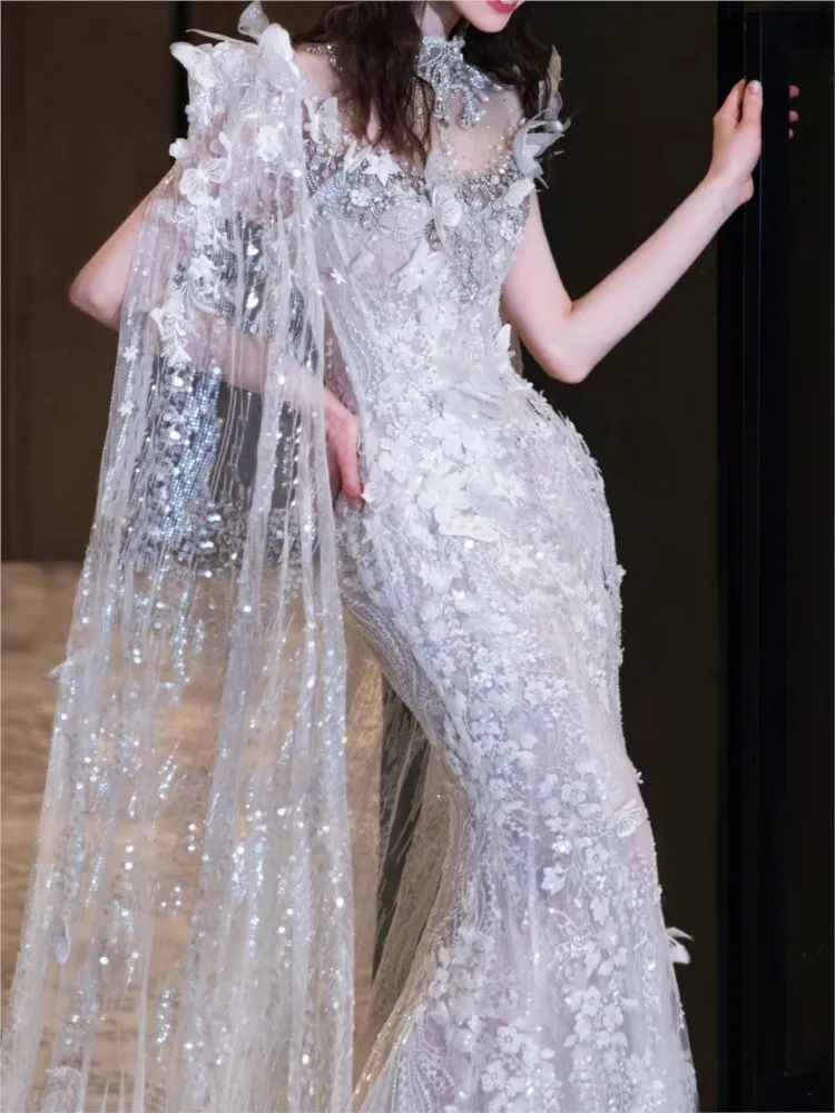 The white host walks runway toasts with beaded and girl wears a strapless dress over her shoulders
The white host walks runway toasts with beaded and girl wears a strapless dress over her shoulders