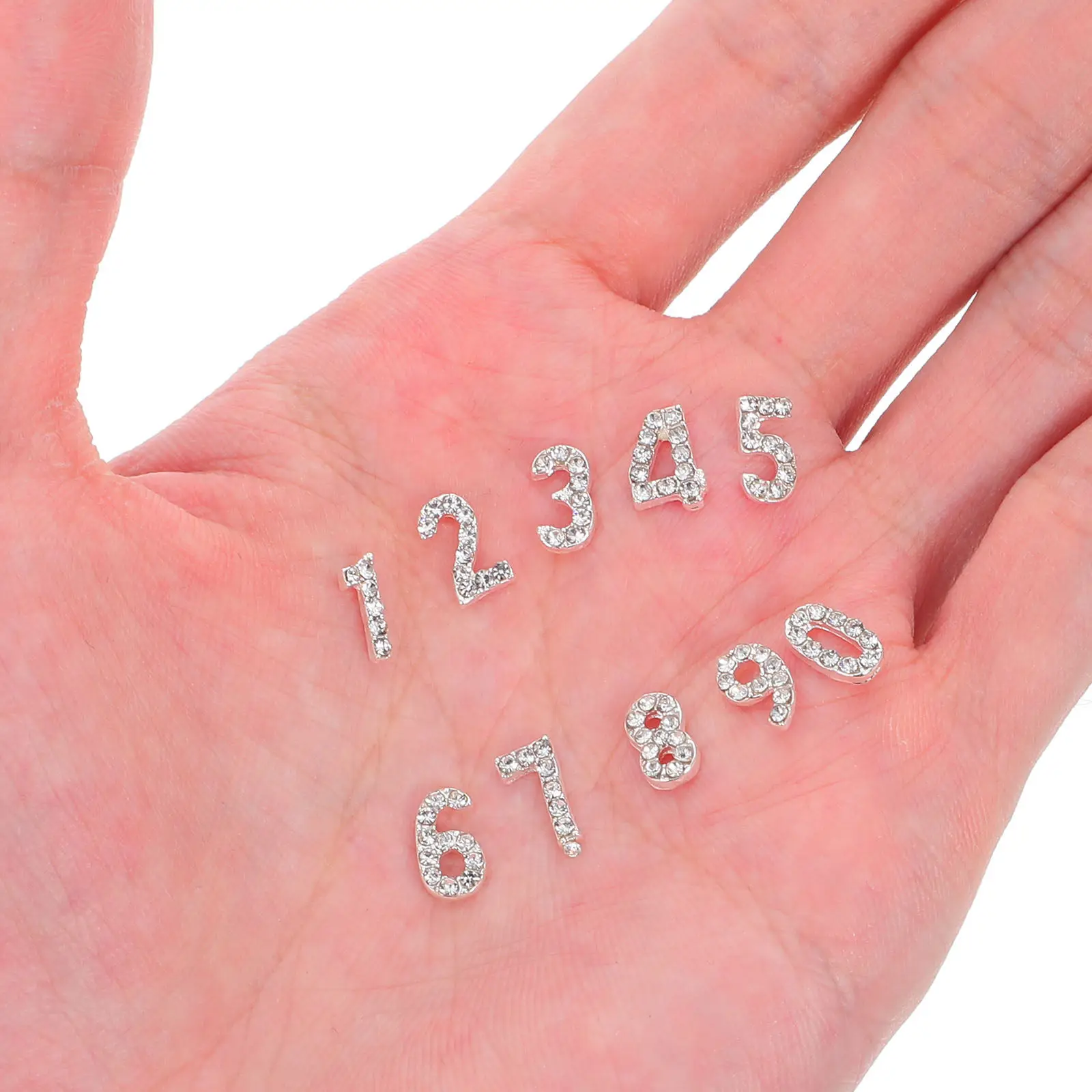 100Pcs Nail Art Charms Rhinestone Number Decorations Flatback Number Nail Jewels Luxury DIY Fingernail Embellishments Party
100Pcs Nail Art Charms Rhinestone Number Decorations Flatback Number Nail Jewels Luxury DIY Fingernail Embellishments Party
