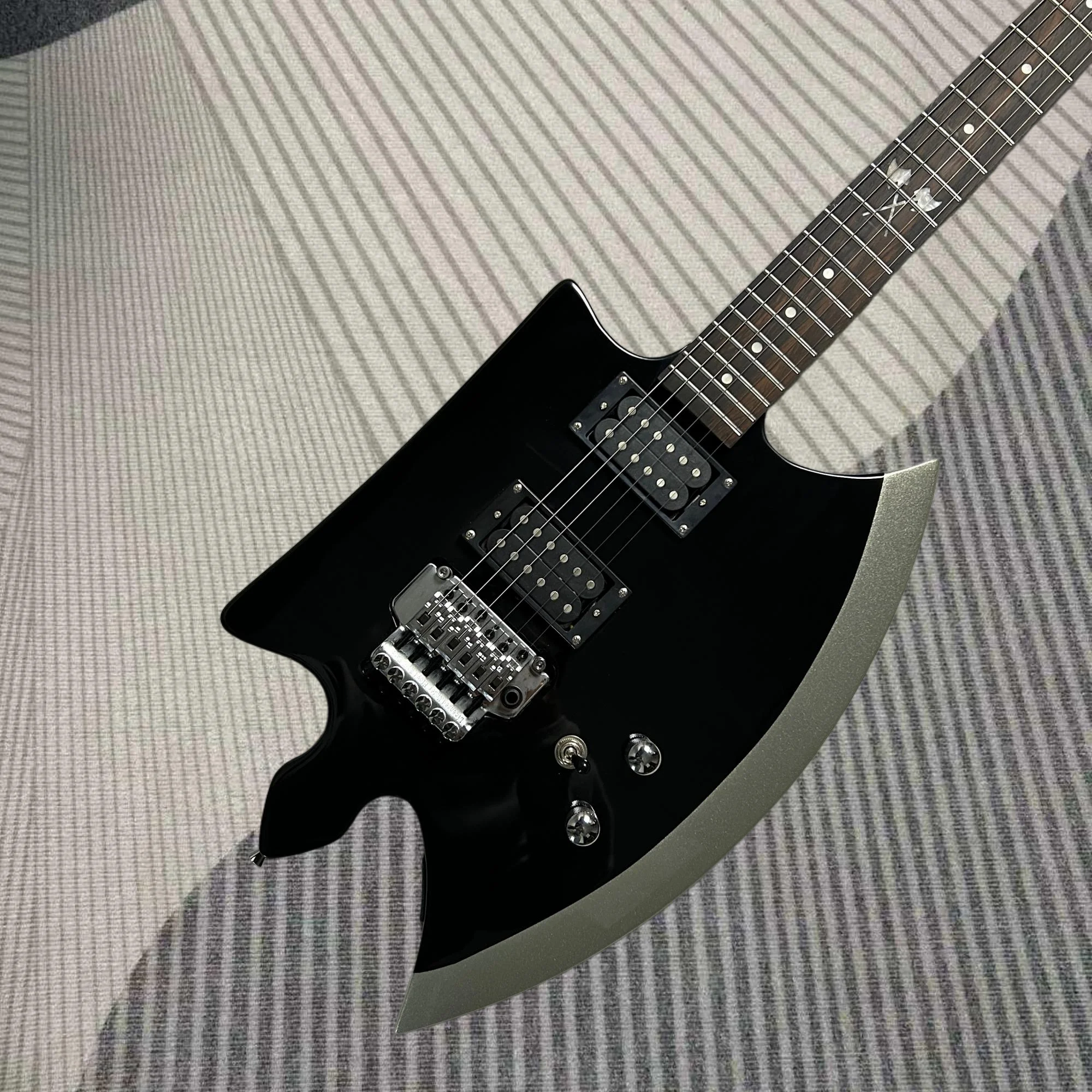 6 Strings Electric Guitar, Axe Shape, Rosewood Fretboard, Black Color, Floyd Rose Tremolo Bridge
6 Strings Electric Guitar, Axe Shape, Rosewood Fretboard, Black Color, Floyd Rose Tremolo Bridge