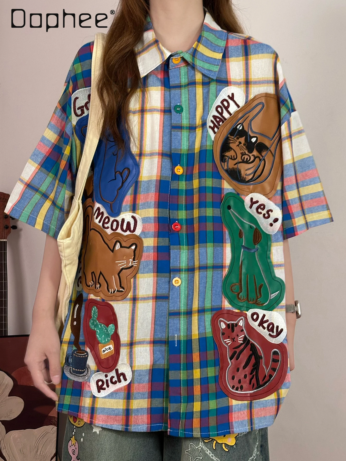 Summer Fun Cartoon Cat Embroidery Color Matching Plaid Short-sleeved Shirt Female 2025 New Women's Lapel Loose Top
Summer Fun Cartoon Cat Embroidery Color Matching Plaid Short-sleeved Shirt Female 2025 New Women's Lapel Loose Top