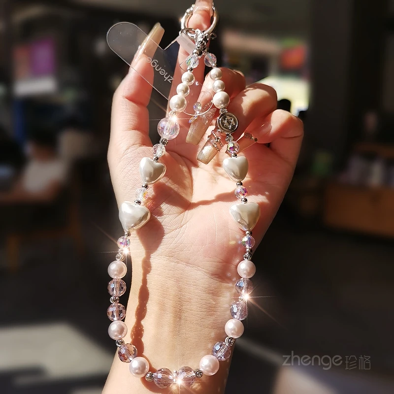 Pearl Phone Chain, Instagram Fashionable Women's Wrist Bead Decoration, High-end Outdoor Anti Throw Lifting Chain
Pearl Phone Chain, Instagram Fashionable Women's Wrist Bead Decoration, High-end Outdoor Anti Throw Lifting Chain