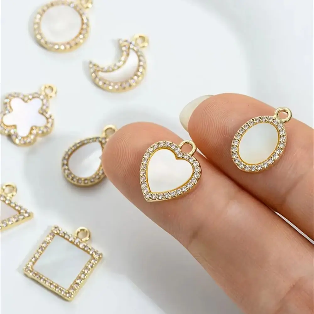 14K Light Gold Zircon Edging Inlaid with Mother of Pearl Geometric Shape Peach Heart Water Droplet Pendant Jewelry
14K Light Gold Zircon Edging Inlaid with Mother of Pearl Geometric Shape Peach Heart Water Droplet Pendant Jewelry