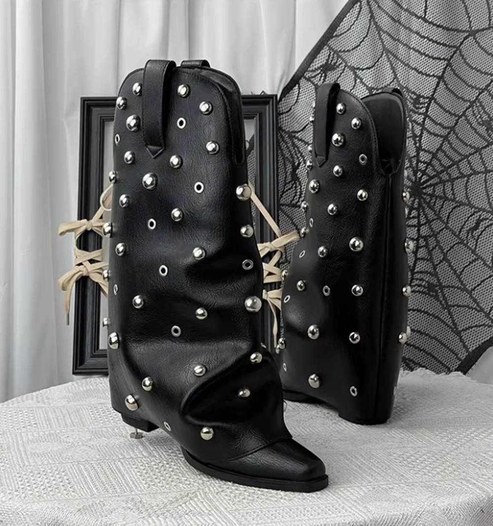 Pointed-Toe Studded Pleated Slouch Boots Oversized Silver Stud Eyelet Detail Black Faux Leather Wedge heel Slip-on Boots
Pointed-Toe Studded Pleated Slouch Boots Oversized Silver Stud Eyelet Detail Black Faux Leather Wedge heel Slip-on Boots