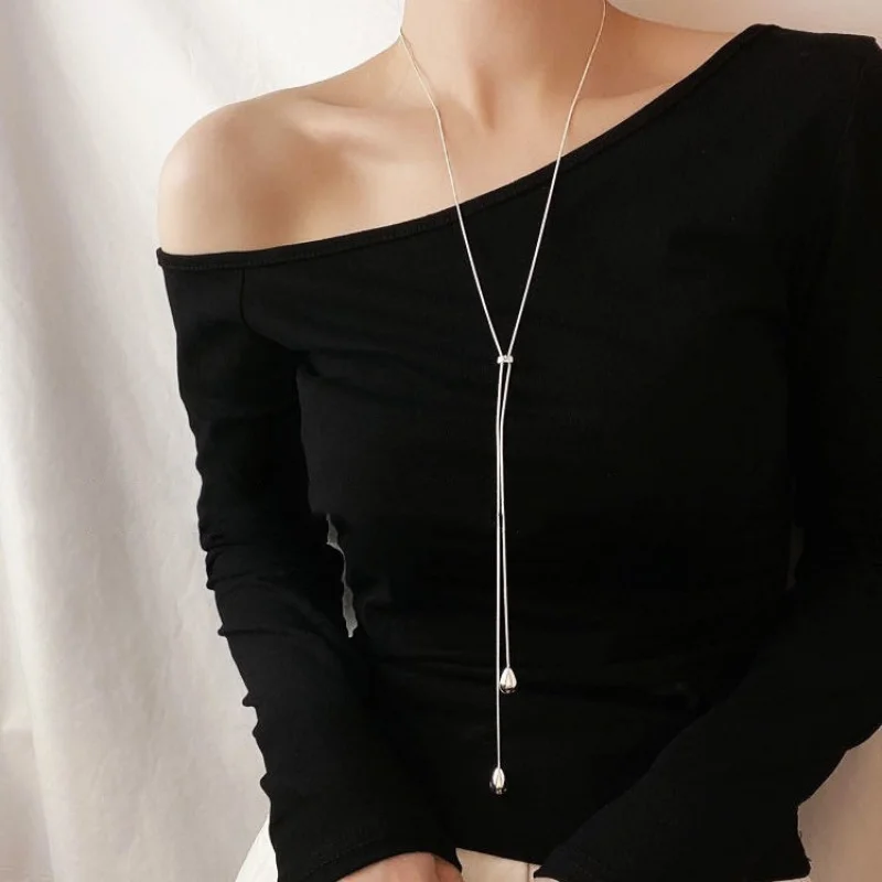 S925 Silver simple long pull adjustable water drop necklace women's niche design autumn and winter sweater chain
S925 Silver simple long pull adjustable water drop necklace women's niche design autumn and winter sweater chain