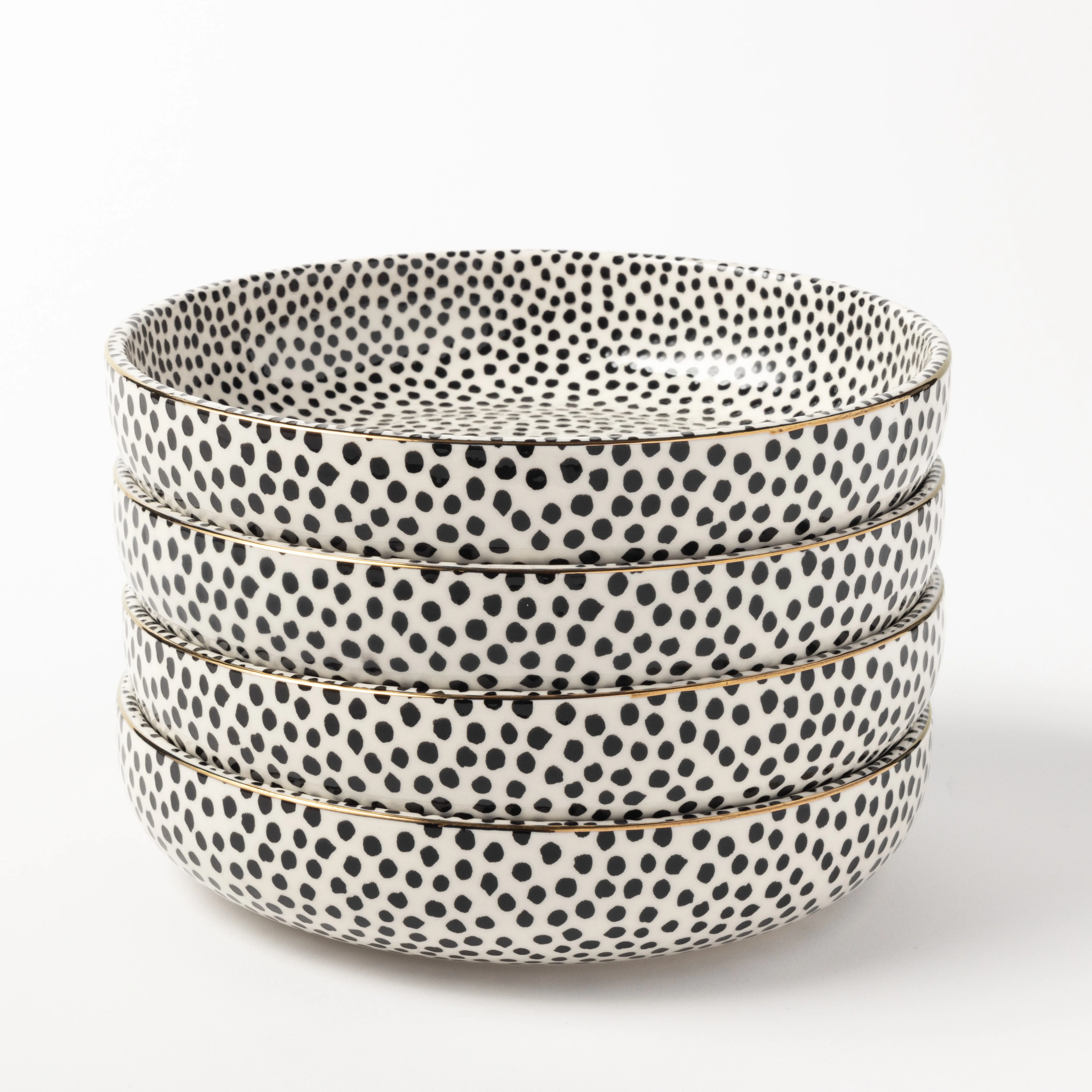 Ceramic low bowls set of four in black and white dot pattern for dining or serving
Ceramic low bowls set of four in black and white dot pattern for dining or serving