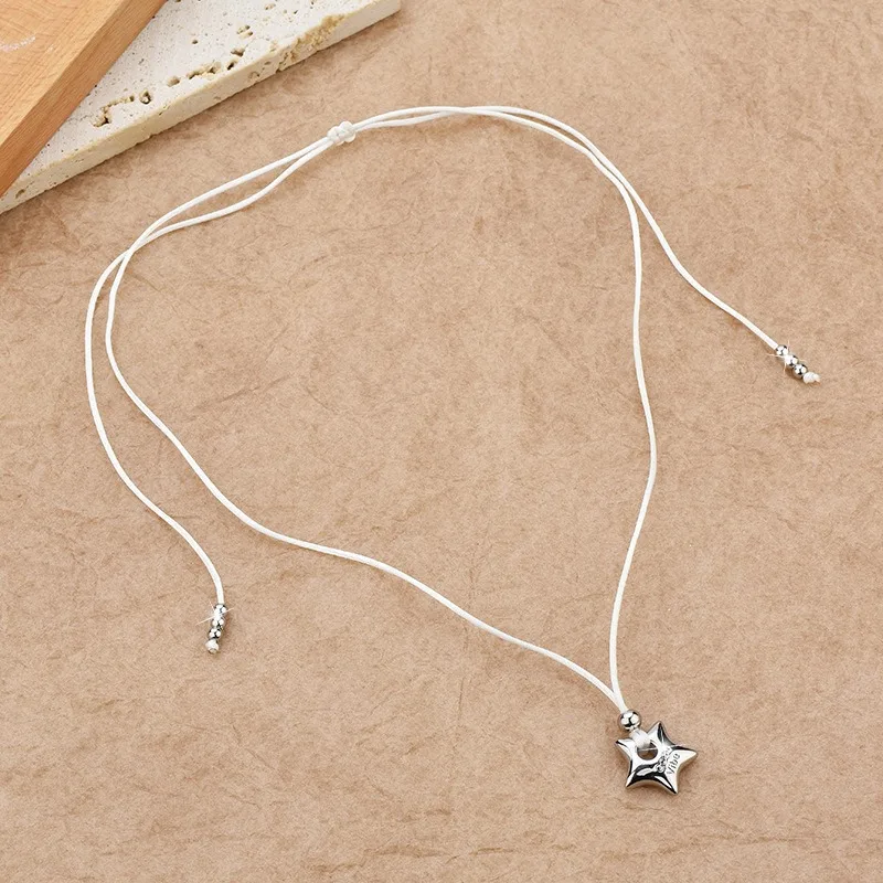 A star-shaped necklace with a Korean InS-style women's woven rope and five-pointed stars
A star-shaped necklace with a Korean InS-style women's woven rope and five-pointed stars