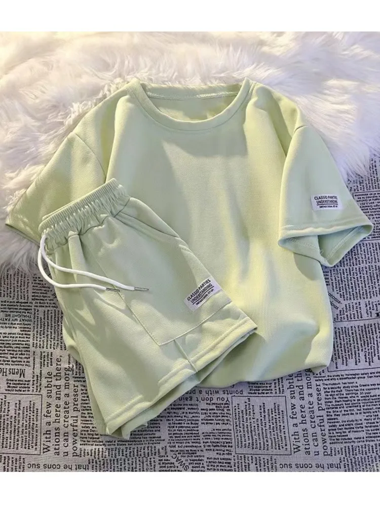 Women Loose-fit Slimming 2 Pieces Sets 2025 Summer Casual Sports Outerwear Streetwear Short Sleeve Tops+drawstring Shorts Outfit
Women Loose-fit Slimming 2 Pieces Sets 2025 Summer Casual Sports Outerwear Streetwear Short Sleeve Tops+drawstring Shorts Outfit