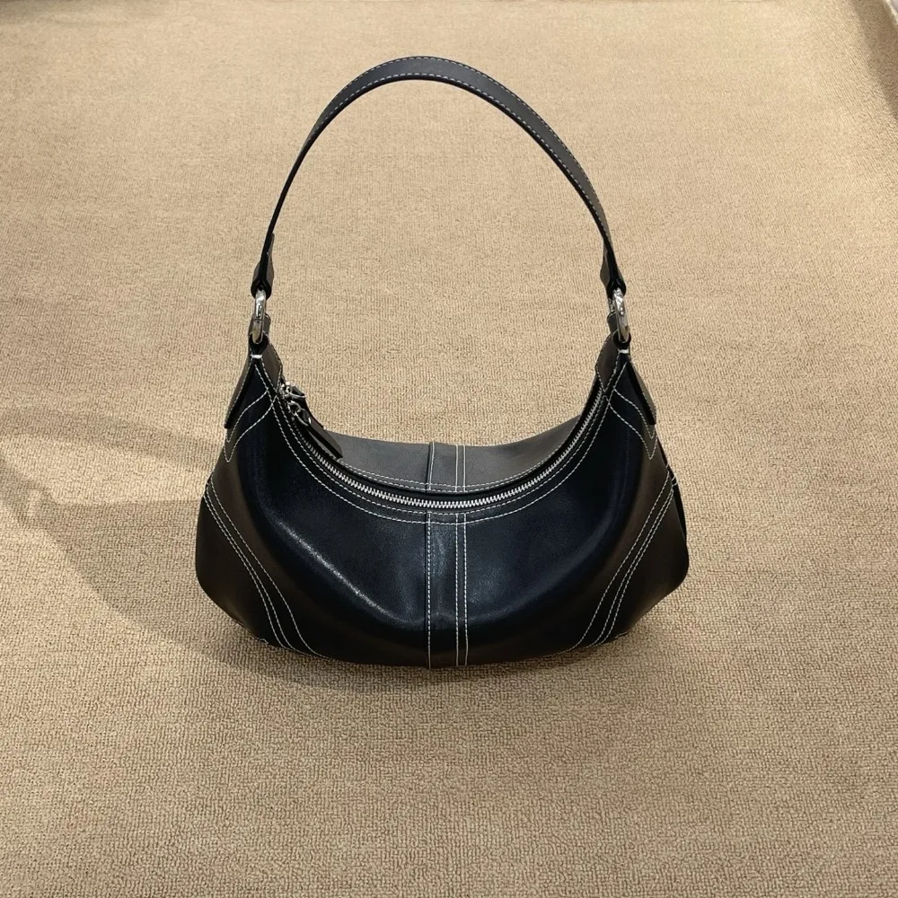 Ретро-сумка на одно плечо/через плечо, осень-зима 2026, новая, вместительная, повседневная, модная, универсальная, с высококачественной текстурой
Ретро-сумка на одно плечо/через плечо, осень-зима 2026, новая, вместительная, повседневная, модная, универсальная, с высококачественной текстурой