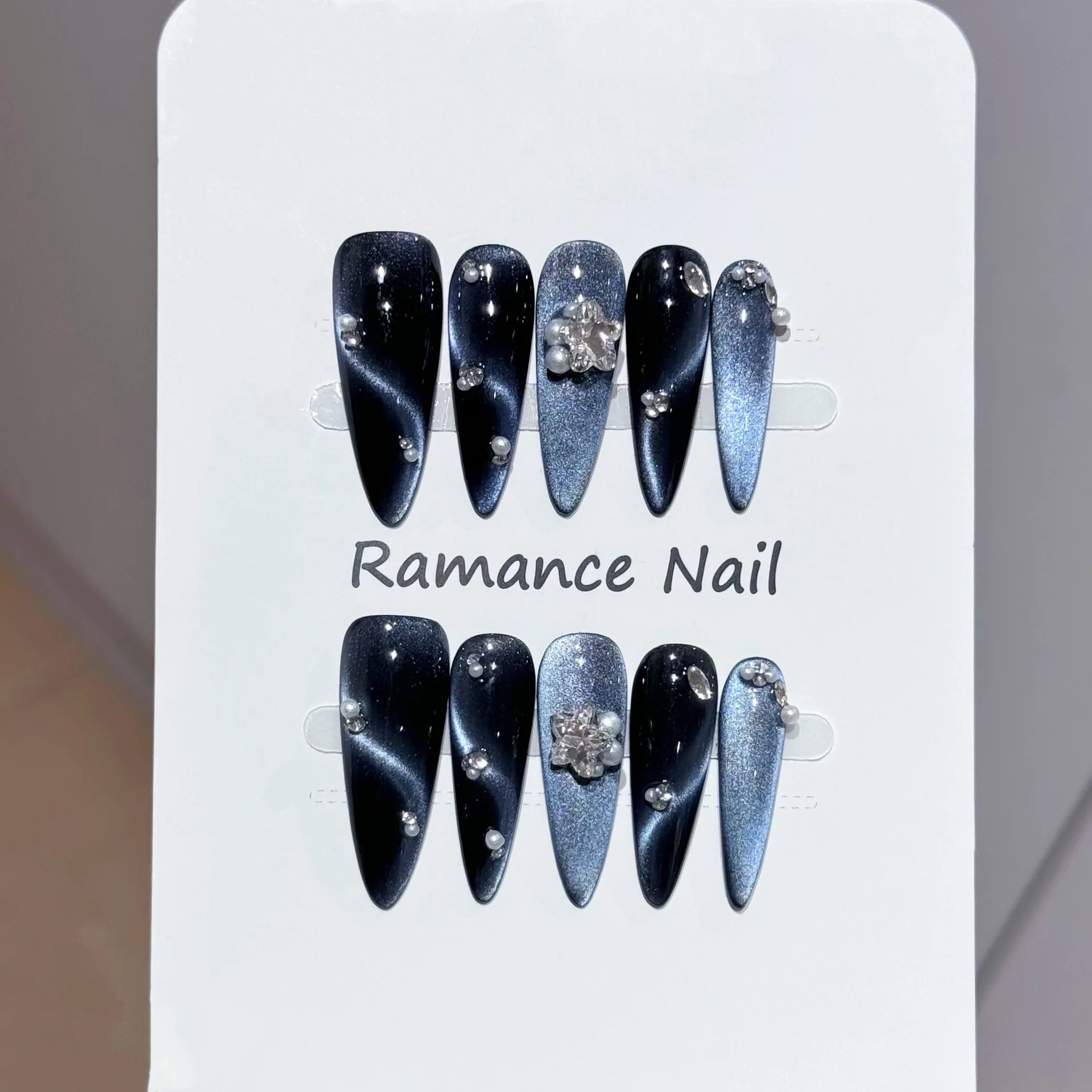 10Pcs Handmade Long Stiletto Press On Nails Black Blue Cat Eye Gradient Fake Nail 3D Silver Flower Pearl Decor Glossy False Nail
10Pcs Handmade Long Stiletto Press On Nails Black Blue Cat Eye Gradient Fake Nail 3D Silver Flower Pearl Decor Glossy False Nail