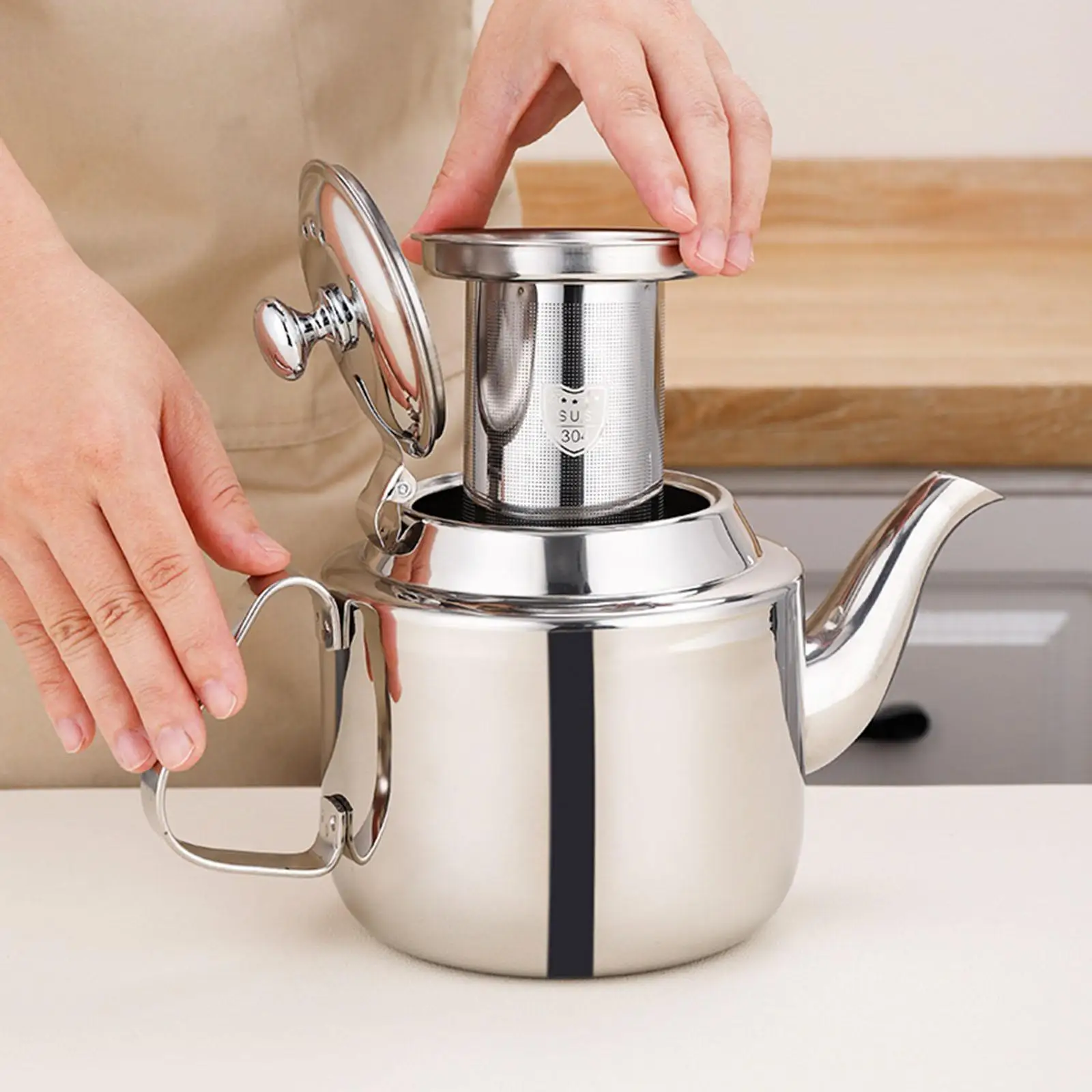 1.4L Stainless Steel Teapot Stovetop Blooming and Loose Leaf Tea Maker with Filter Water Kettle for Home Household Hotel Kitchen
1.4L Stainless Steel Teapot Stovetop Blooming and Loose Leaf Tea Maker with Filter Water Kettle for Home Household Hotel Kitchen