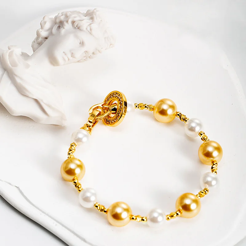 French Entry Luxury Pearl Beaded Bracelet Retro Exquisite High-end Sense Pig Nose Clasp Micro-inlaid Zircon Jewelry
French Entry Luxury Pearl Beaded Bracelet Retro Exquisite High-end Sense Pig Nose Clasp Micro-inlaid Zircon Jewelry