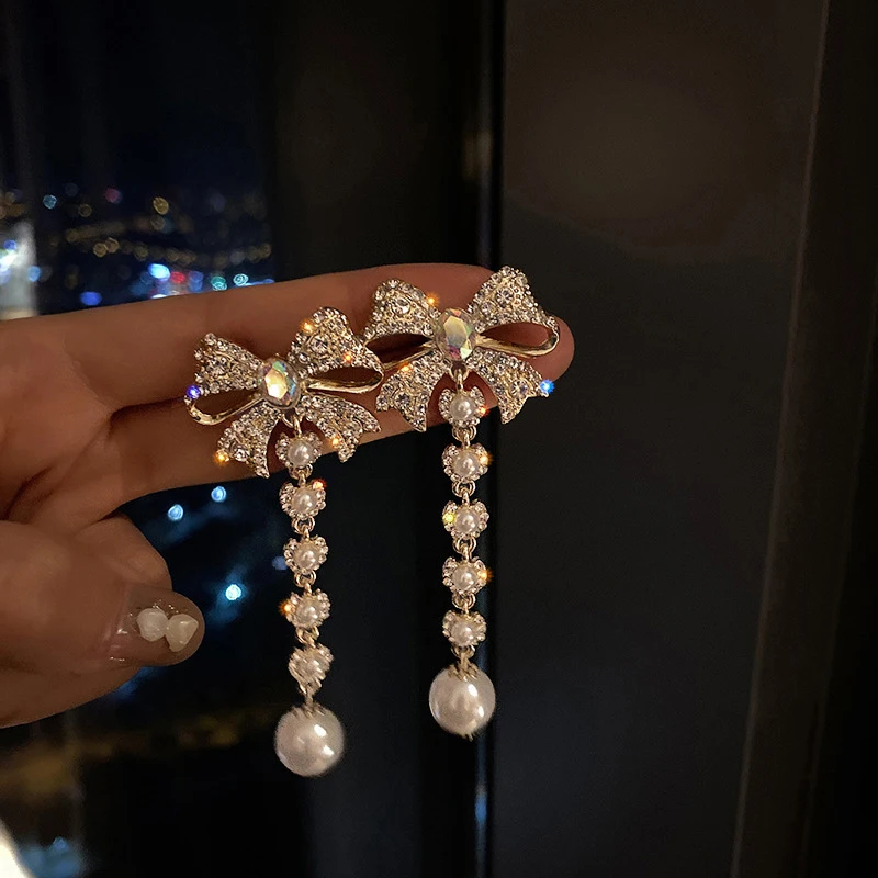 Korean Elegant Rhinestone Bowknot Drop Earrings for Women Girls Fashion Long Tassel Pearl Pendientes Weddings Party Jewelry
Korean Elegant Rhinestone Bowknot Drop Earrings for Women Girls Fashion Long Tassel Pearl Pendientes Weddings Party Jewelry