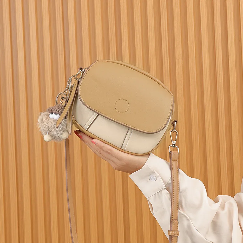 High end small round leather bag, new fashionable crossbody bag with contrasting straps, multi-layer hand-held single shoulder w
High end small round leather bag, new fashionable crossbody bag with contrasting straps, multi-layer hand-held single shoulder w