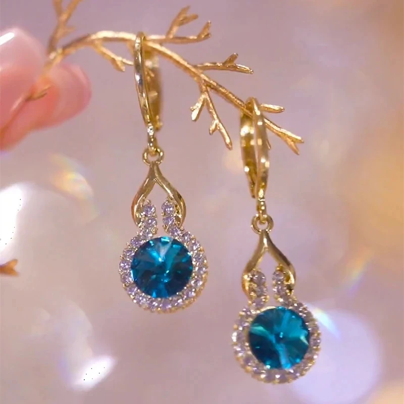 Fashion Trend Blue Crystal Zircon Gourd Pendant Gold Color Earrings for Women Elegant Exquisite Ladies Wedding Premium Jewelry
Fashion Trend Blue Crystal Zircon Gourd Pendant Gold Color Earrings for Women Elegant Exquisite Ladies Wedding Premium Jewelry