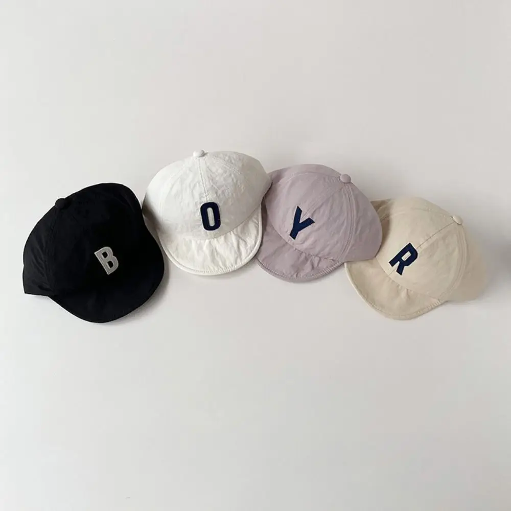 Korean Summer Letter Baseball Cap Quick-drying Thin Children Peaked Hat Outdoor Breathable Baby Sunscreen Cap Boys Girls
Korean Summer Letter Baseball Cap Quick-drying Thin Children Peaked Hat Outdoor Breathable Baby Sunscreen Cap Boys Girls