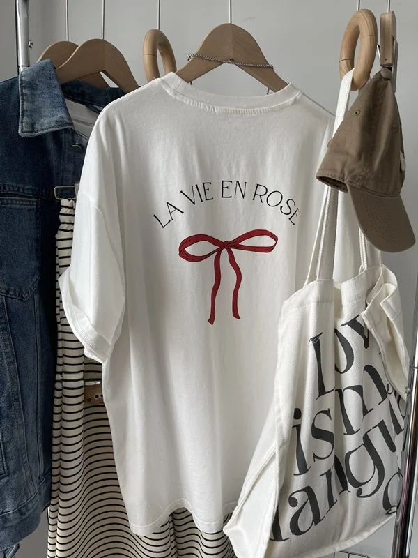 Свободная женская футболка с узлом на спине в американском уличном стиле, новая весенняя версия, повседневная, с коротким рукавом, из смесового хлопка
Свободная женская футболка с узлом на спине в американском уличном стиле, новая весенняя версия, повседневная, с коротким рукавом, из смесового хлопка