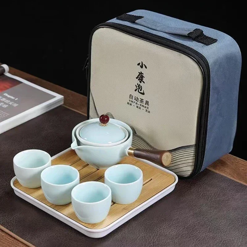 Chinoiserie Travel Set Porcelain Chinese Kungfu Set Portable Teapot Tea Cup Tea Tray and Infuser Travel Bag Packaging
Chinoiserie Travel Set Porcelain Chinese Kungfu Set Portable Teapot Tea Cup Tea Tray and Infuser Travel Bag Packaging