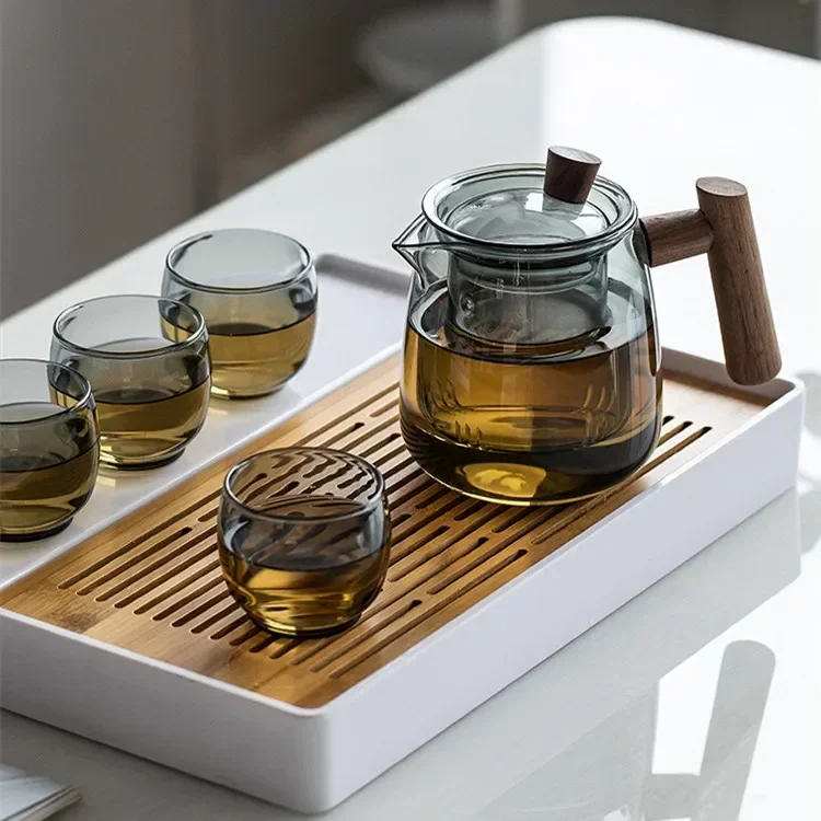 Hehuan one pot four cups set transparent black glass side wood thickened flower teapot brewing teapot glass brewing teapot
Hehuan one pot four cups set transparent black glass side wood thickened flower teapot brewing teapot glass brewing teapot